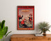 Vintage-Werbeplakat Grandes Galeries modernes, Agen, gerahmt über einer Kommode aus Holz, zwischen Pflanzen.