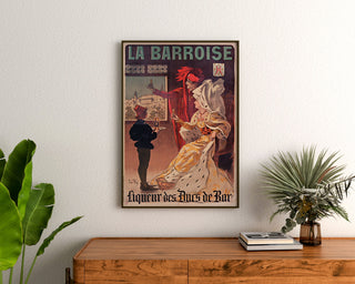 Vintage-Werbeplakat La Barroise, eingerahmt über einer Holzkommode, zwischen Pflanzen.