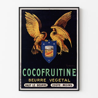 Vintage-Plakat „Cocofruitine, pflanzliche Butter“ in einem schlanken Rahmen an einer hellen Wand.