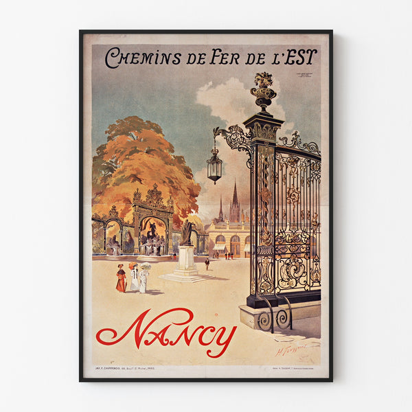Vintage-Poster Nancy, chemins de fer de l’Est, in einem dünnen Rahmen an einer hellen Wand.