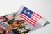 Malaysisches Propagandaposter mit Grußfigur und Konfliktszene